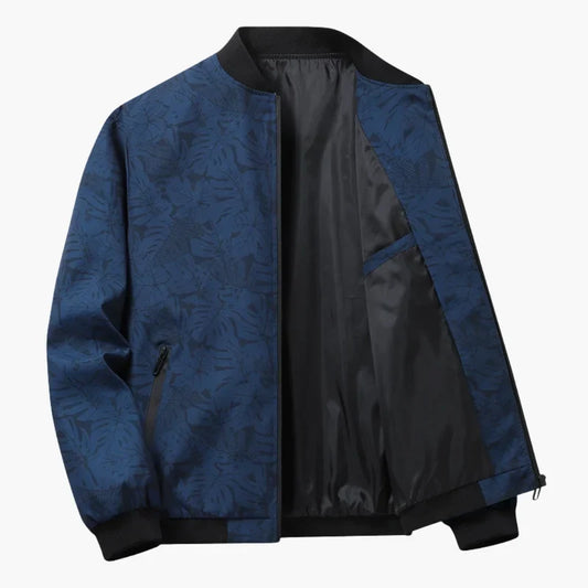Blouson bomber Louis bleu à motif feuillagé, fermeture zippée, poignets côtelés.