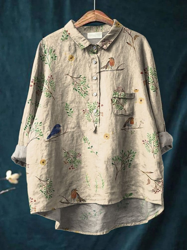 Chemise beige à boutons avec poche poitrine et motifs oiseaux et fleurs