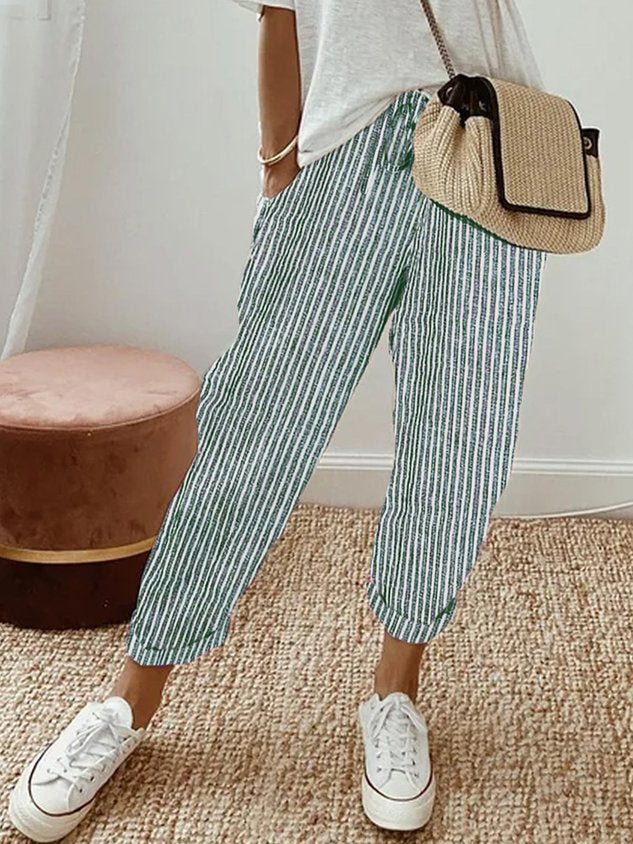 Pantalon fluide rayé vert et blanc, taille élastique, jambes amples aux chevilles