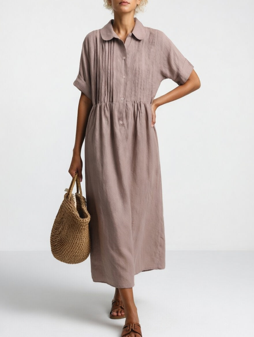 Robe chemise fluide rose poudré, manches courtes, col, patte boutonnée, taille froncée