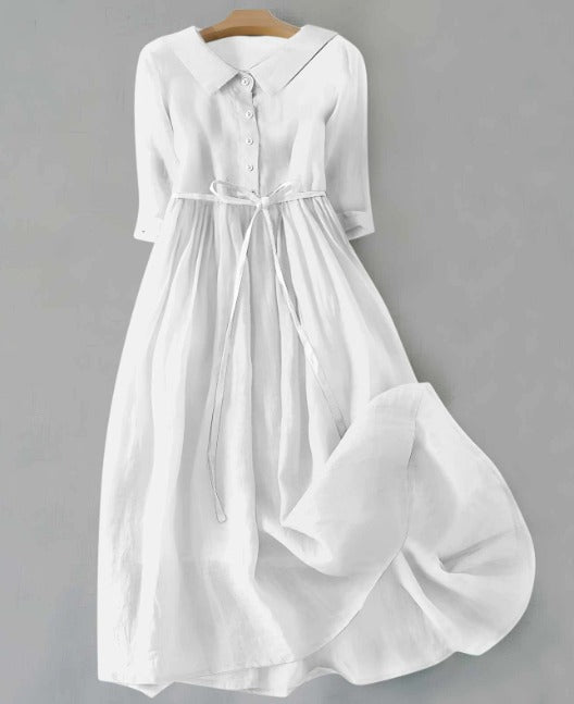 Robe élégante blanche à manches courtes, boutonnée devant, liens à la taille