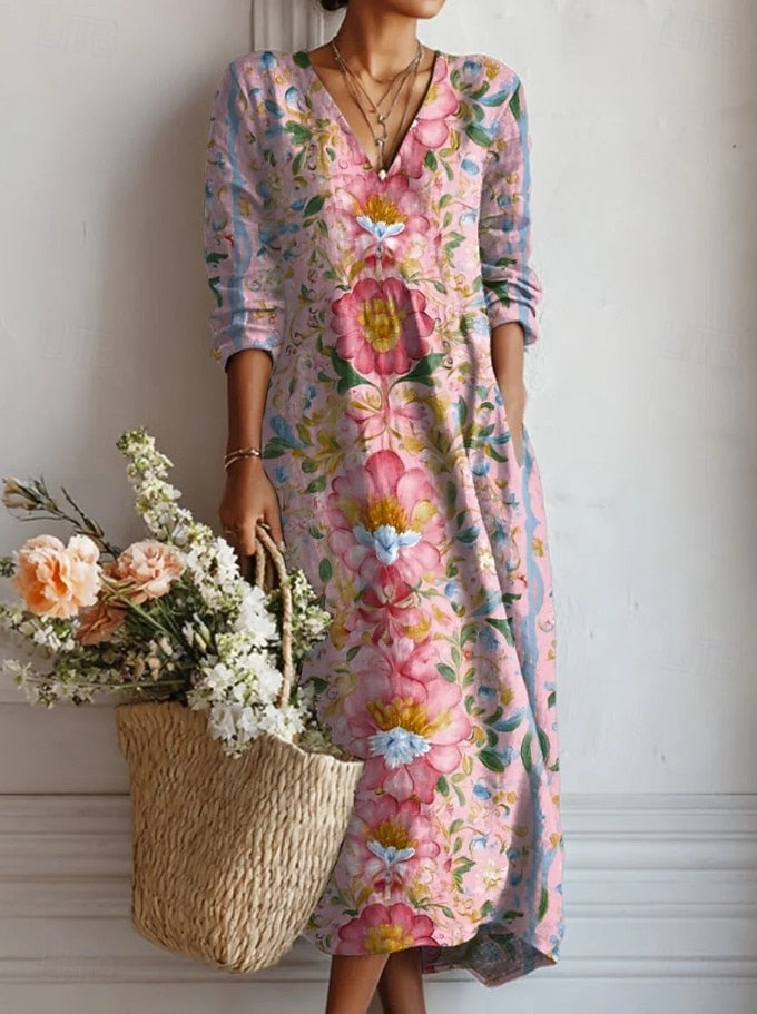 Robe mi-longue à manches longues, encolure V, imprimé floral multicolore.