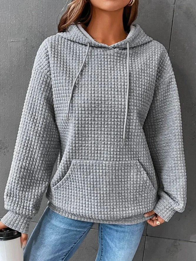 Sweat-shirt à capuche gris clair en tissu texturé, poche kangourou et cordons