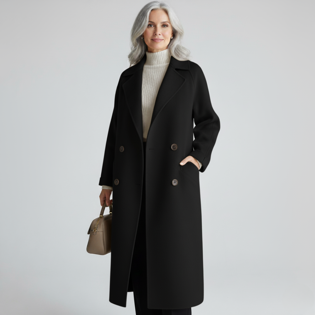 Manteau long noir à revers crantés, double boutonnage et poches plaquées.