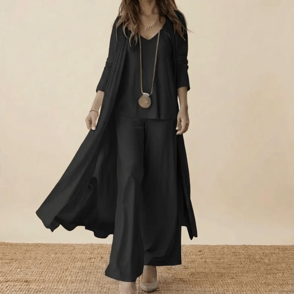 Ensemble 3 pièces noir : tunique longue, veste ouverte et pantalon fluide.