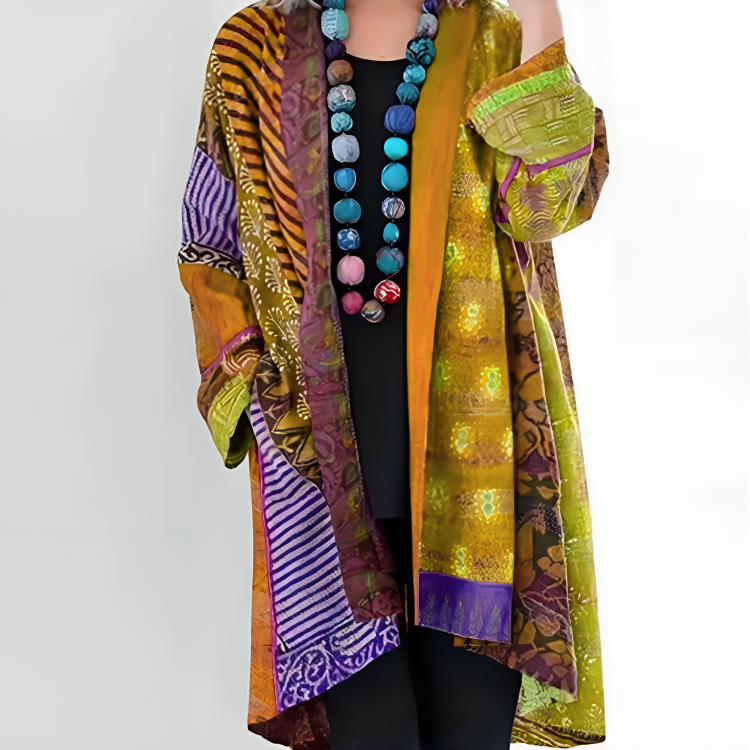 Gilet long jaune doré à motifs, manches kimono, bordures violet et crème.