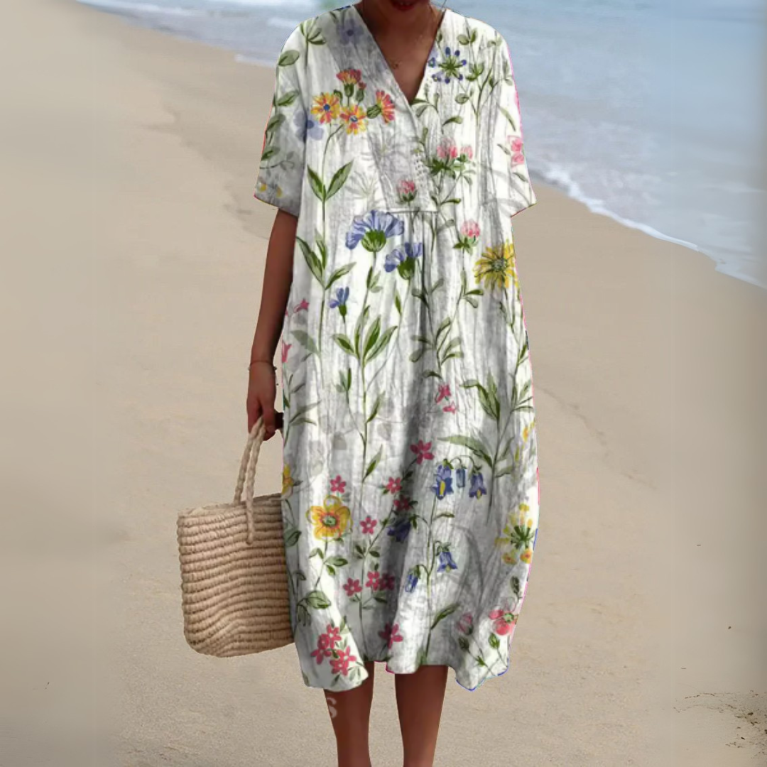 Robe blanche à fleurs colorées, encolure V, manches courtes, taille froncée