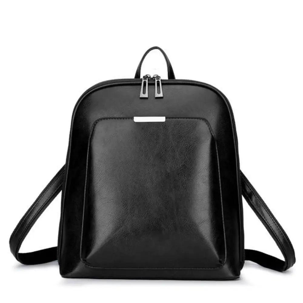 Sac à dos en cuir noir à double zip, vue de face avec poche centrale