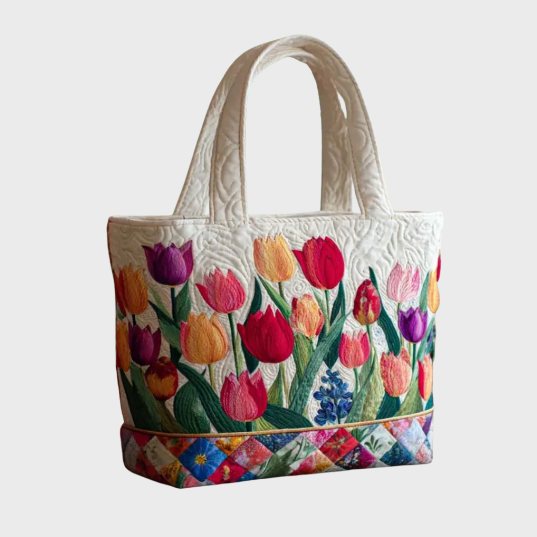 Sac cabas crème imprimé tulipes multicolores, bande contrastée patchwork en bas.