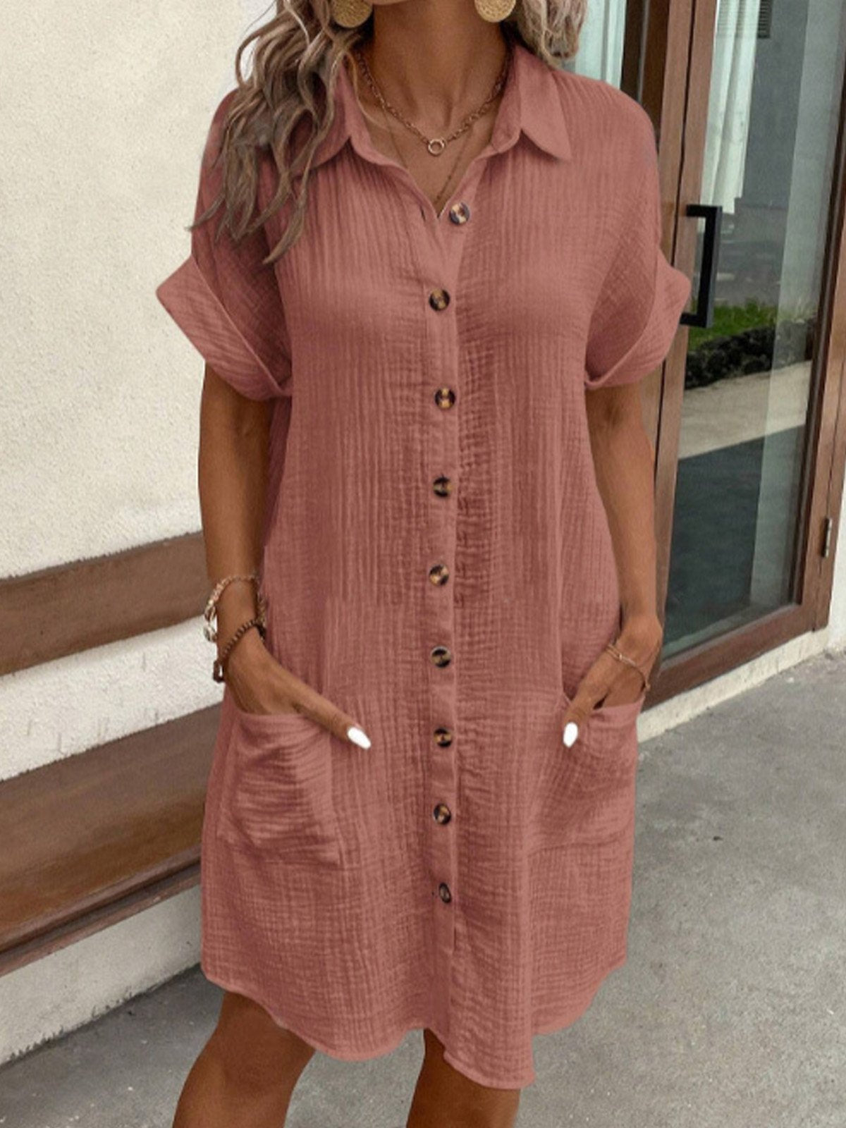 Robe polo oversize rose, col, manches courtes, boutonnage, poches latérales