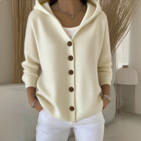 Gilet à capuche beige clair, fermeture boutonnée, manches longues, style décontracté.