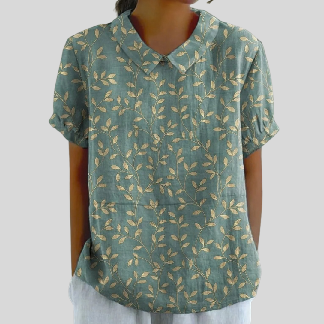 Blouse légère manches courtes, col en V, motif feuillage vert et doré