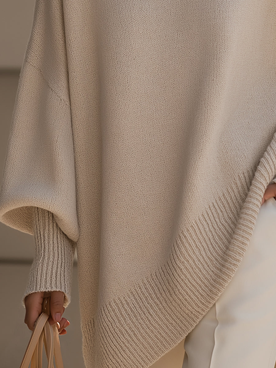 Pull ample à coupe fluide beige, maille texturée, ourlet côtelé en diagonale, manches tombantes