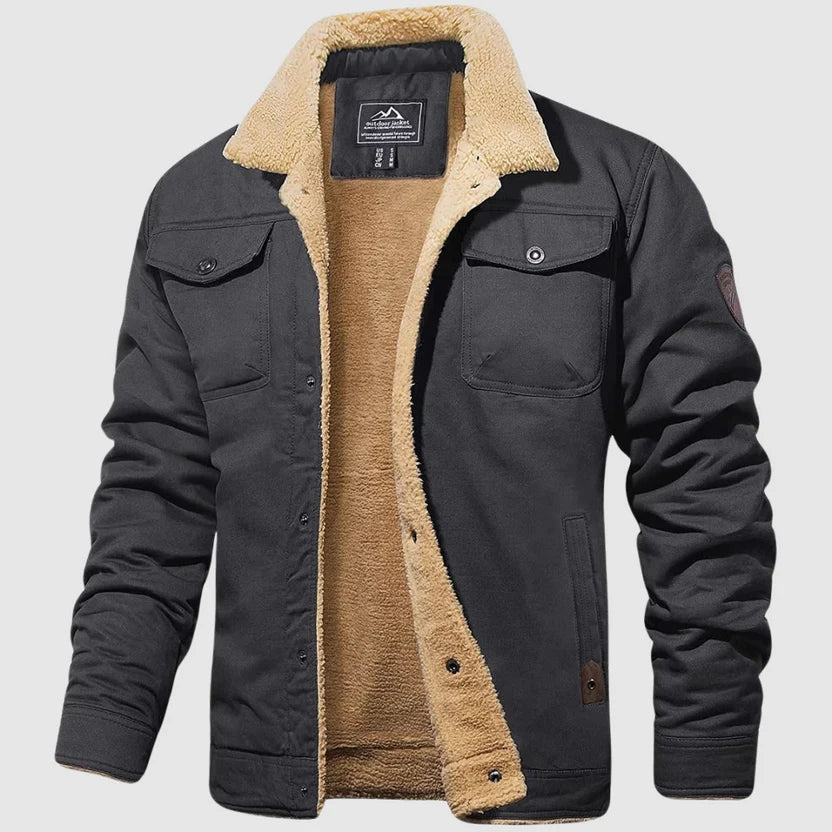 Blouson bomber chaud gris foncé doublé sherpa beige, col montant et poches poitrine.