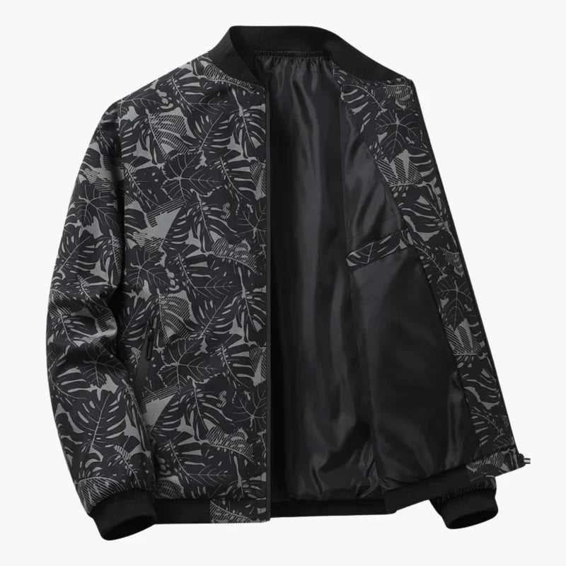 Blouson bomber noir à imprimé feuilles, fermeture zippée, col et poignets côtelés.