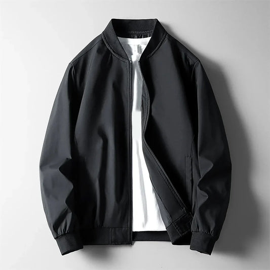 Blouson bomber coupe-vent noir, zip devant, col montant, poignets côtelés