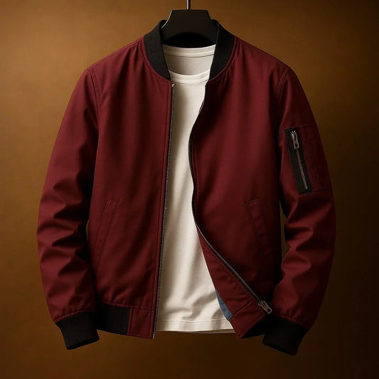 Blouson bomber zippé bordeaux, col et poignets côtelés, poche zippée sur la manche