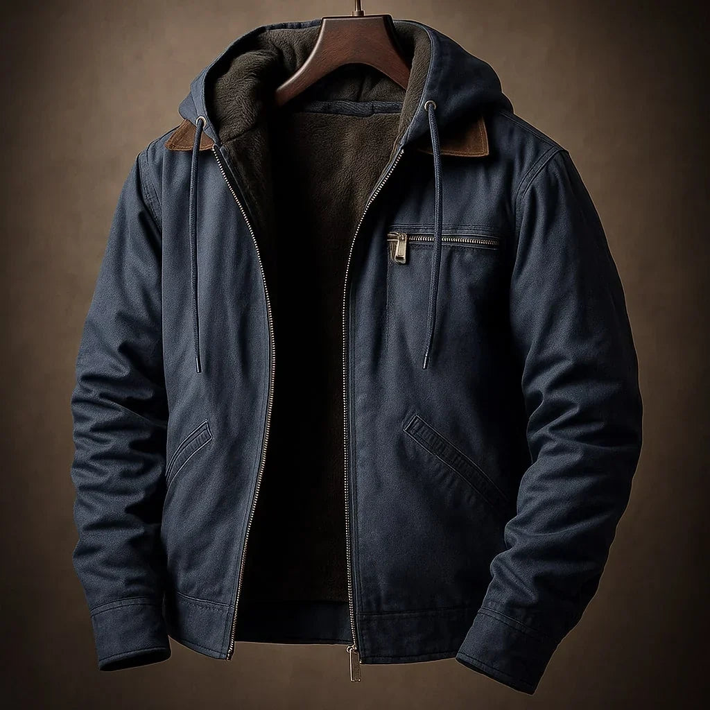 Veste à capuche bleu marine zippée, poche zippée poitrine et cordons de capuche.