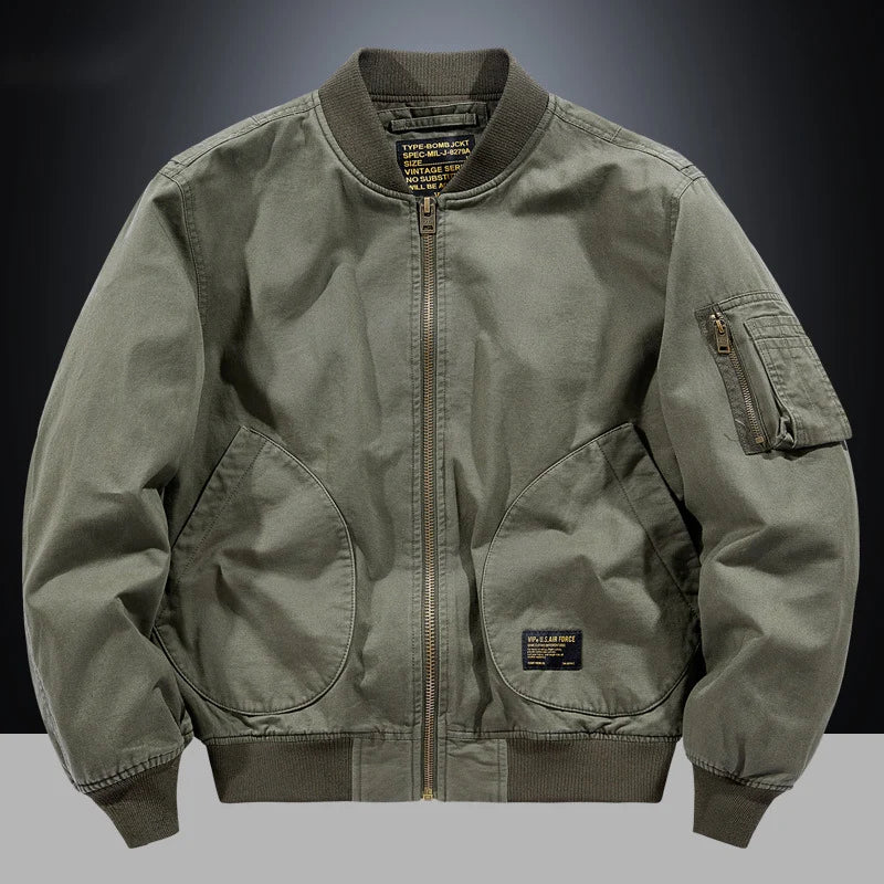 Blouson bomber vintage vert à fermeture zippée et poches zippées sur la manche