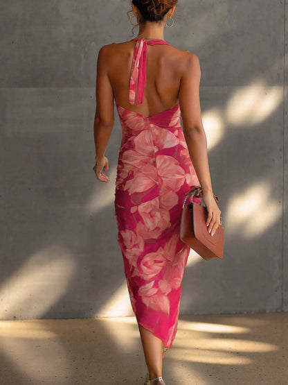 Robe midi fuchsia sans manches à imprimé floral, dos nu, fronces et fente latérale