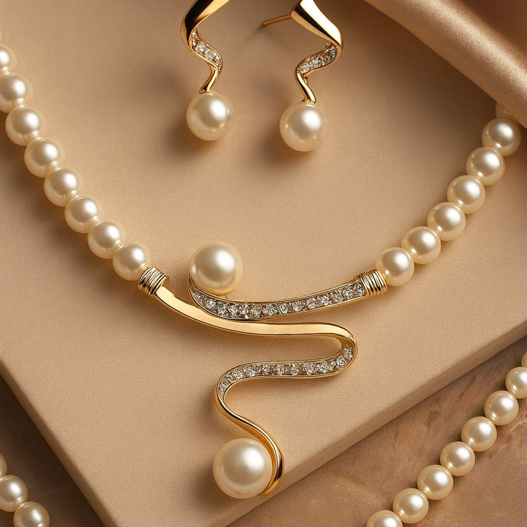 Parure perles : collier rang de perles et pendentif vague strass, boucles goutte