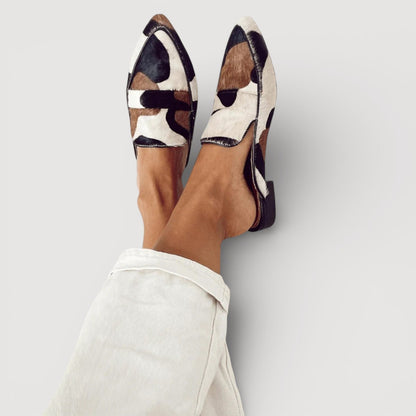 Mocassins slip-on à imprimé peau, semelle basse et petit talon, multicolores.