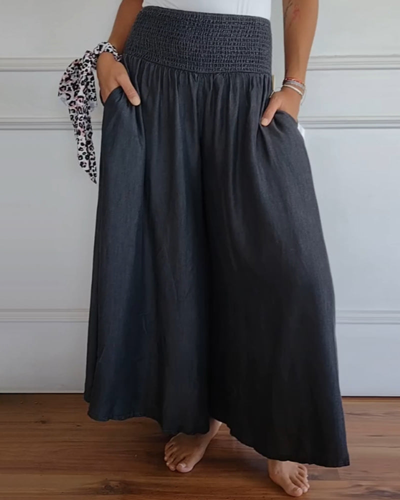 Pantalon ample gris foncé, taille élastique froncée, jambe large