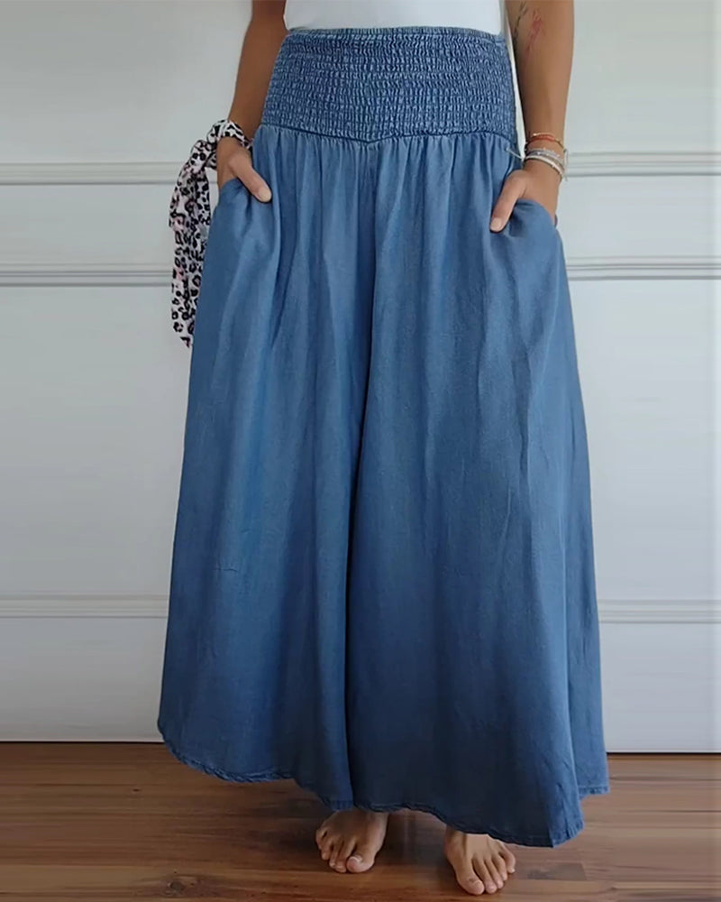 Pantalon ample bleu, taille élastique froncée, coupe ample et longue