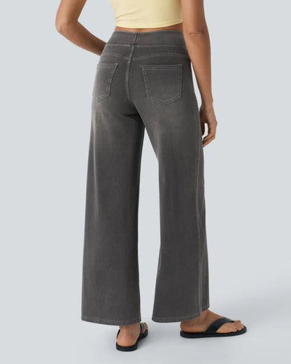 Jean à jambe large gris foncé, coupe ample, poches avant et surpiqûres