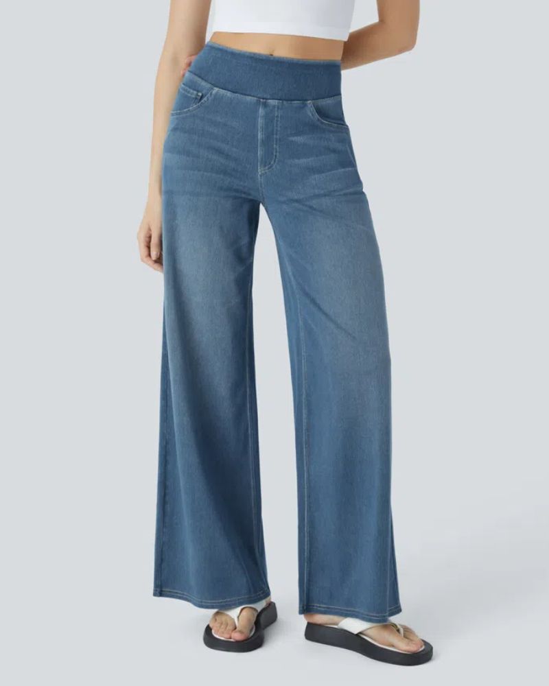 Jean à jambe large en denim bleu moyen, taille mi-haute, poches avant et arrière.
