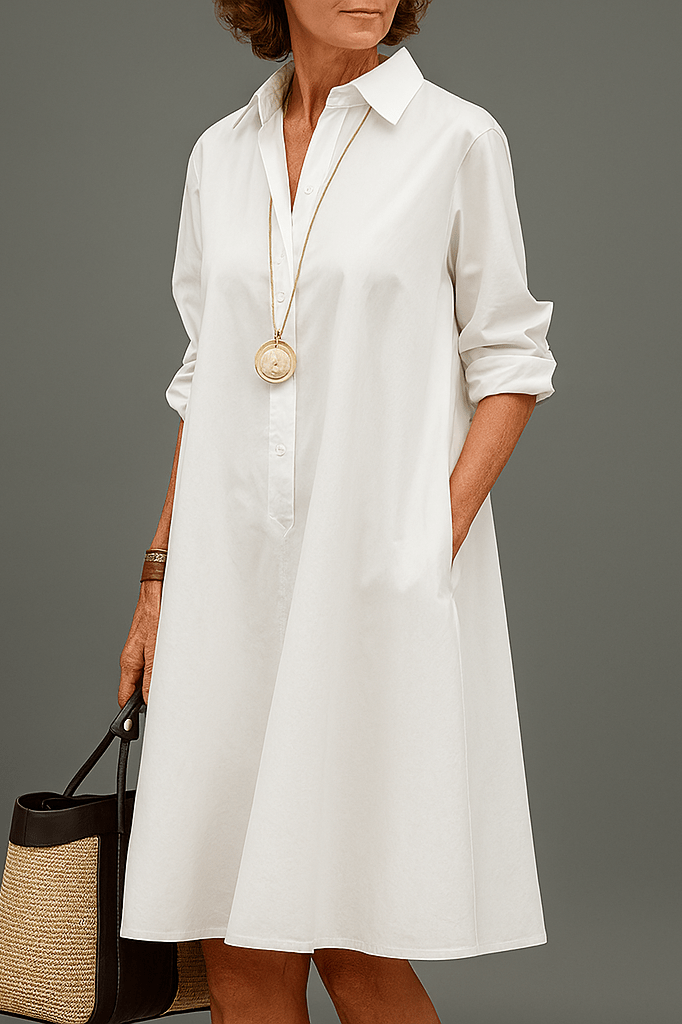 Robe midi blanche en coton, col chemise, patte boutonnée, manches longues, coupe évasée
