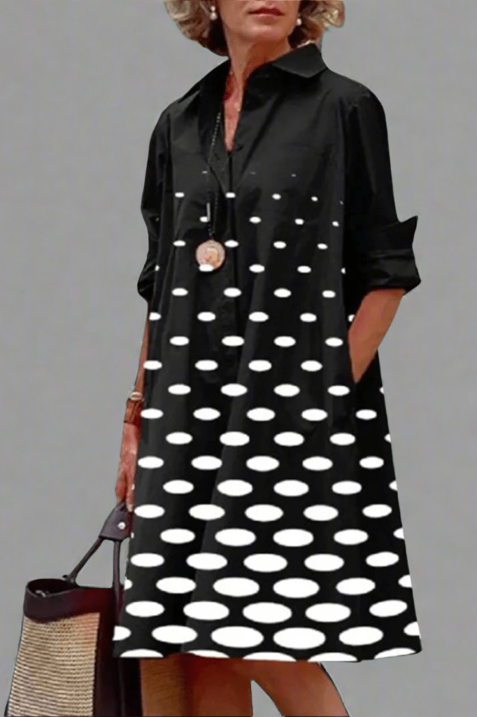 Robe midi noire à pois blancs, manches longues, col chemise et patte boutonnée