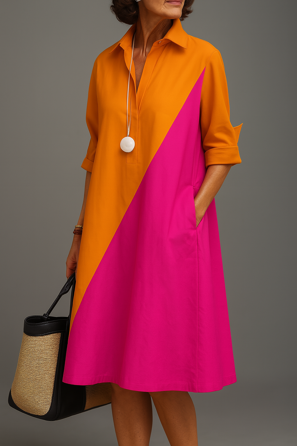 Robe midi soignée bicolore orange et fuchsia, empiècement diagonal