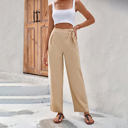 Pantalon Sabby beige, taille élastique avec cordon, coupe ample, poches sur les côtés