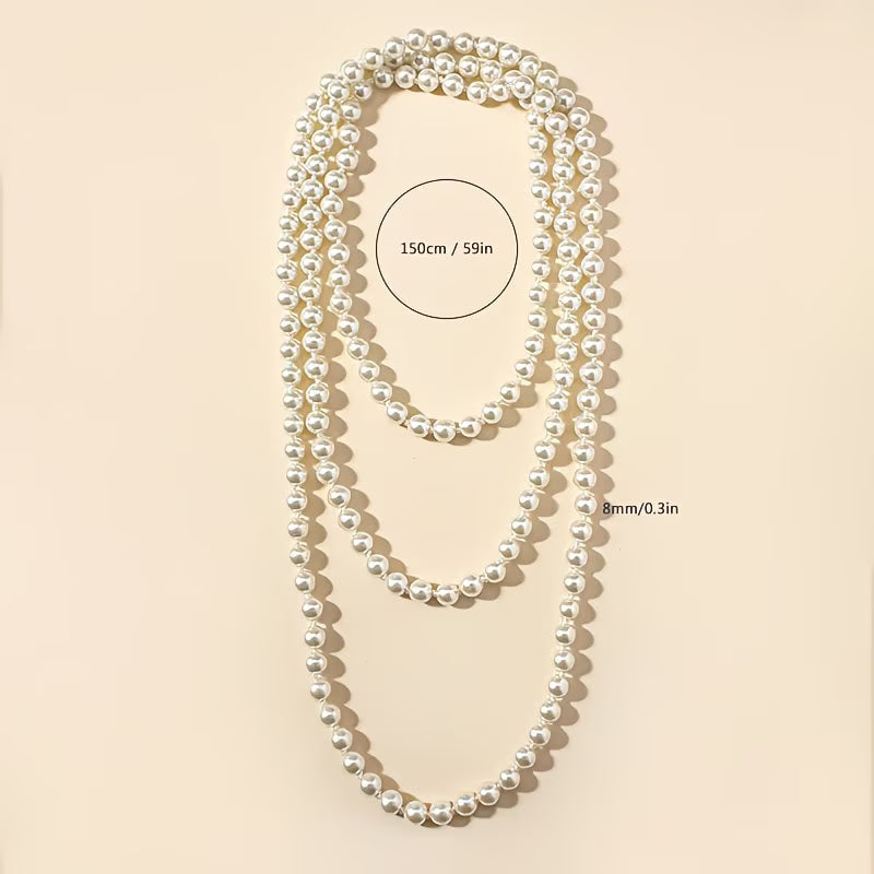 Collier double perles nacrées blanches, 150 cm; perles 8 mm de diamètre.