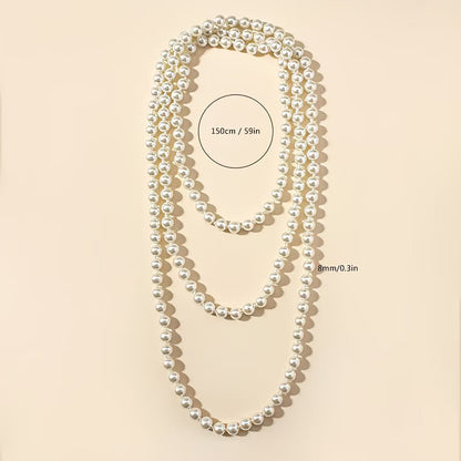 Collier double perles nacrées blanches, 150 cm; perles 8 mm de diamètre.