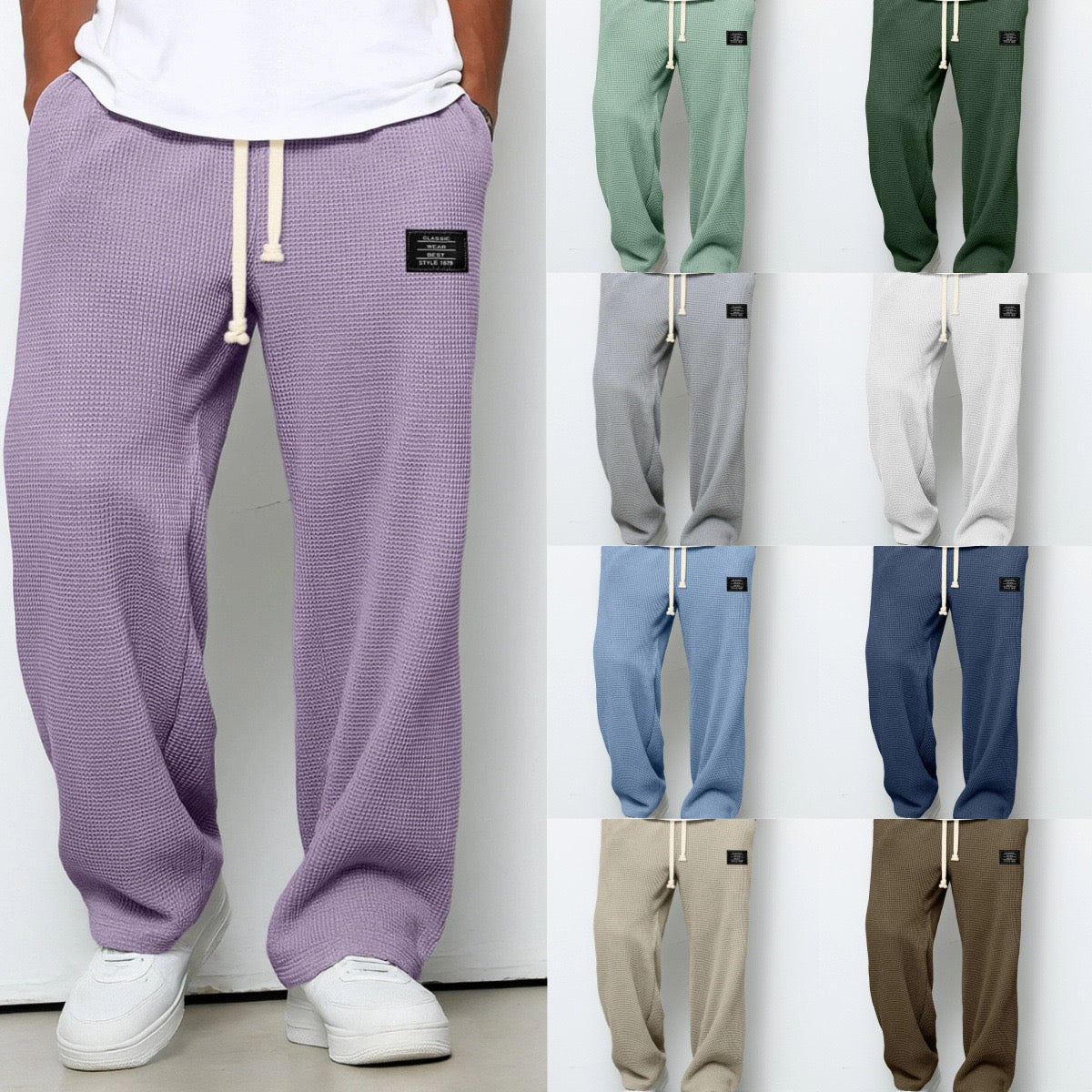 Pantalon ample violet à taille élastique et cordon, étiquette sur la hanche droite.