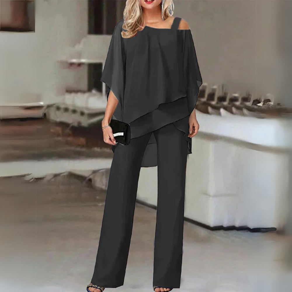 Ensemble noir : haut drapé asymétrique et pantalon évasé