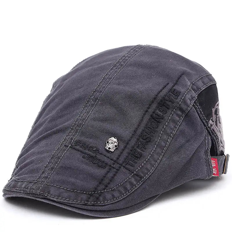 Casquette d’été Bloom™ gris foncé, vue latérale avec patch logo et sangle.