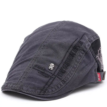 Casquette d’été Bloom™ gris foncé, vue latérale avec patch logo et sangle.