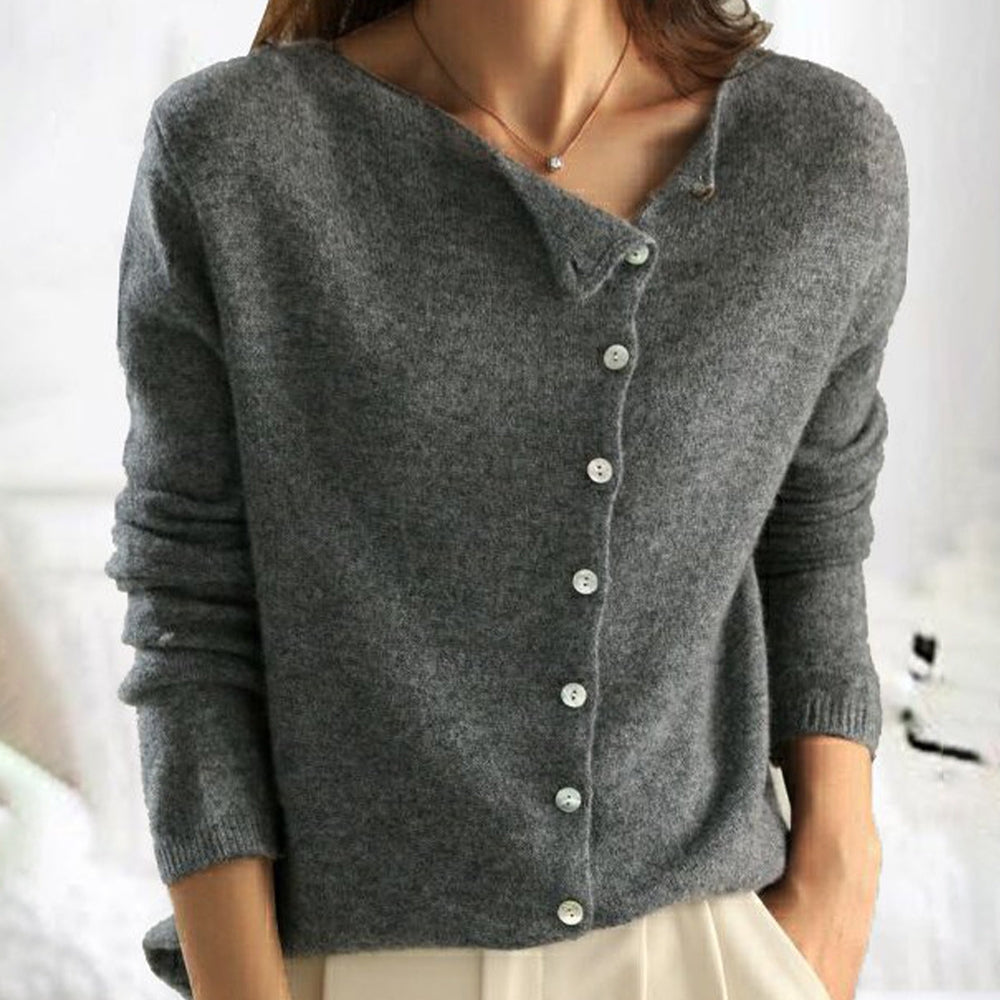 Veste en maille gris anthracite à boutons, encolure décolletée, manches longues.