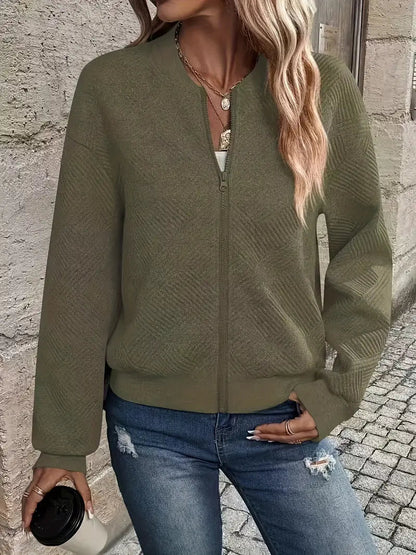 Veste légère vert armée à fermeture éclair, manches longues, texture en relief.
