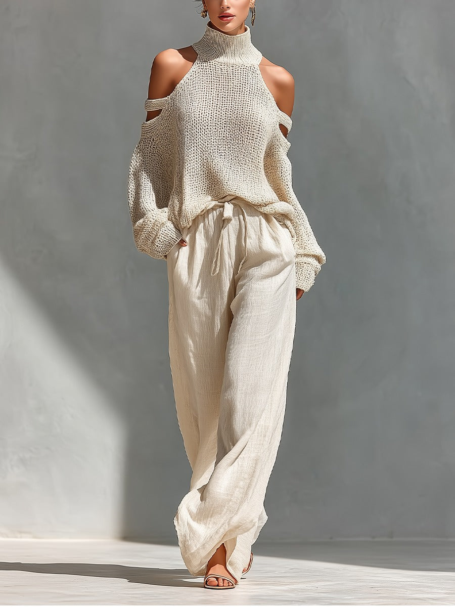Ensemble deux pièces beige : pull côtelé col montant épaules dénudées et pantalon ample