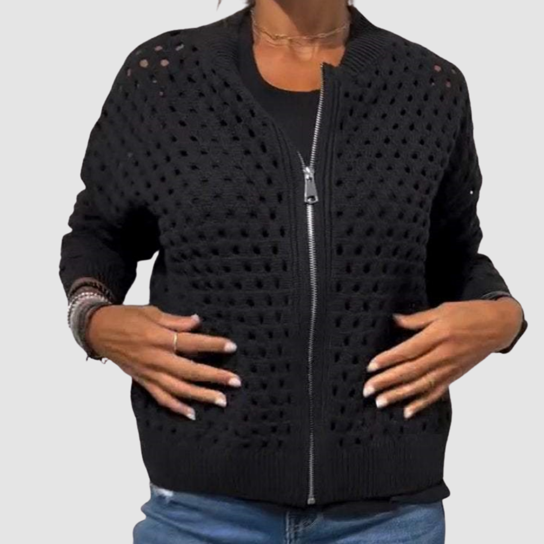 Gilet en tricot noir à motifs ajourés, zip au centre, finitions côtelées