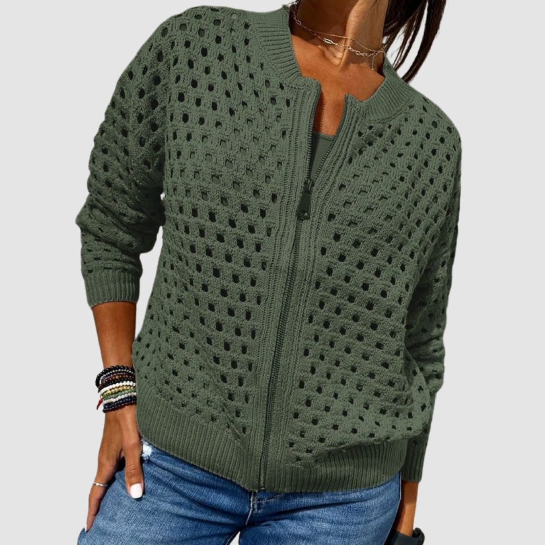 Gilet en tricot vert à mailles ajourées, fermeture zippée, poignets et bas côtelés