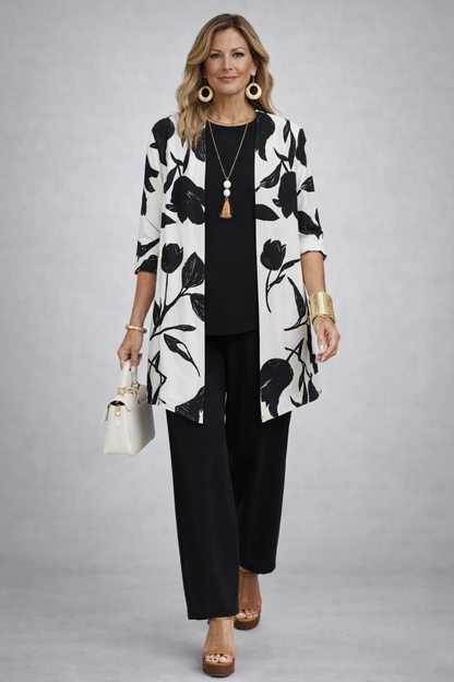 Ensemble 3 pièces : veste à fleurs, top noir, pantalon noir, vue de face