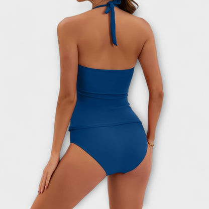 Maillot de bain deux pièces bleu, dos avec lien au cou, haut bandeau et culotte
