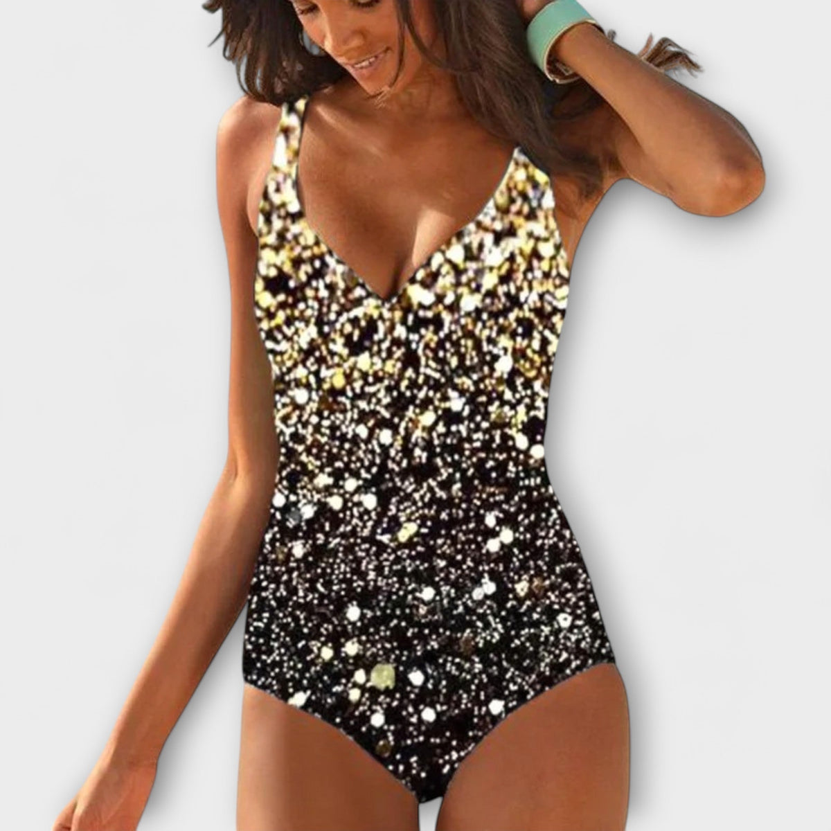 Maillot de bain une pièce noir à motifs pailletés dorés, décolleté V effet croisé