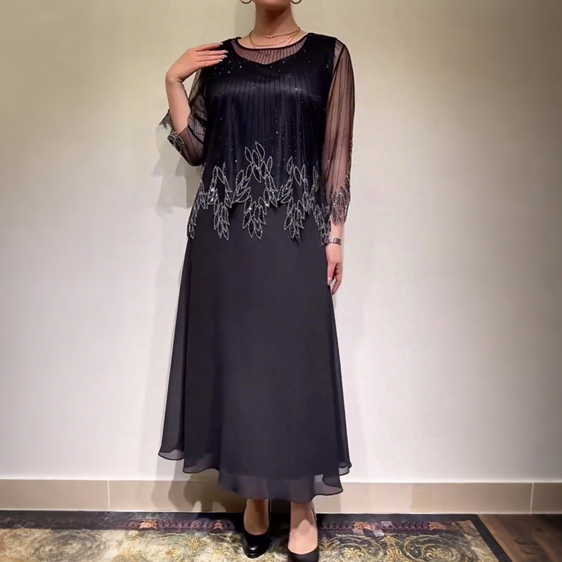 Robe midi noire à manches voile transparent, motif floral brodé sur le devant