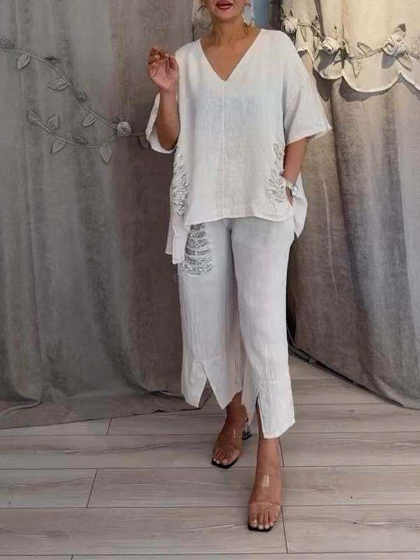 Ensemble deux pièces en lin blanc : blouse ample manches courtes et pantalon ample capri